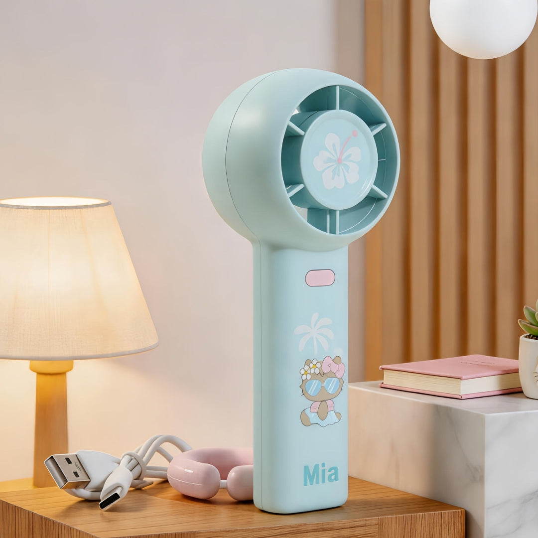 Ergonomisk designet mini-vifte for kvinner med søtt dyremotiv. Nyt kjølig komfort overalt, hjemme eller på jobb.