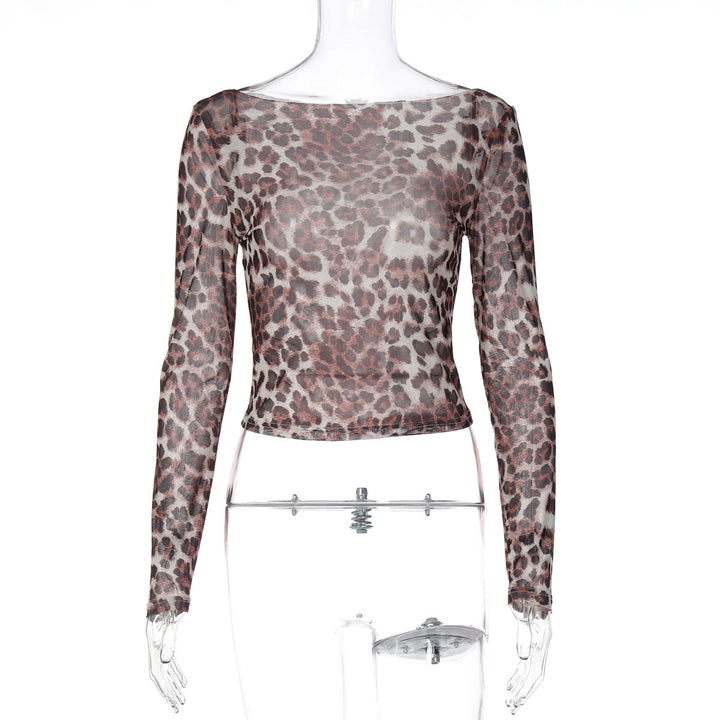 Trendy damebluse i leopardmønster med lange ermer og en klassisk rund hals, ideell for et moteriktig antrekk.