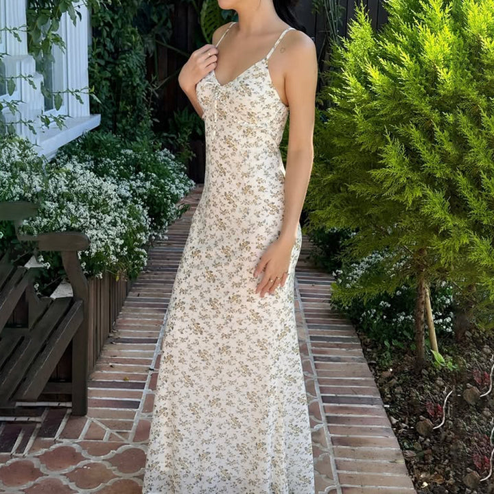 Elegant lys gul blomstret stroppekjole for damer. A-linje sommerkjole med justerbare stropper, ideell for fritid.