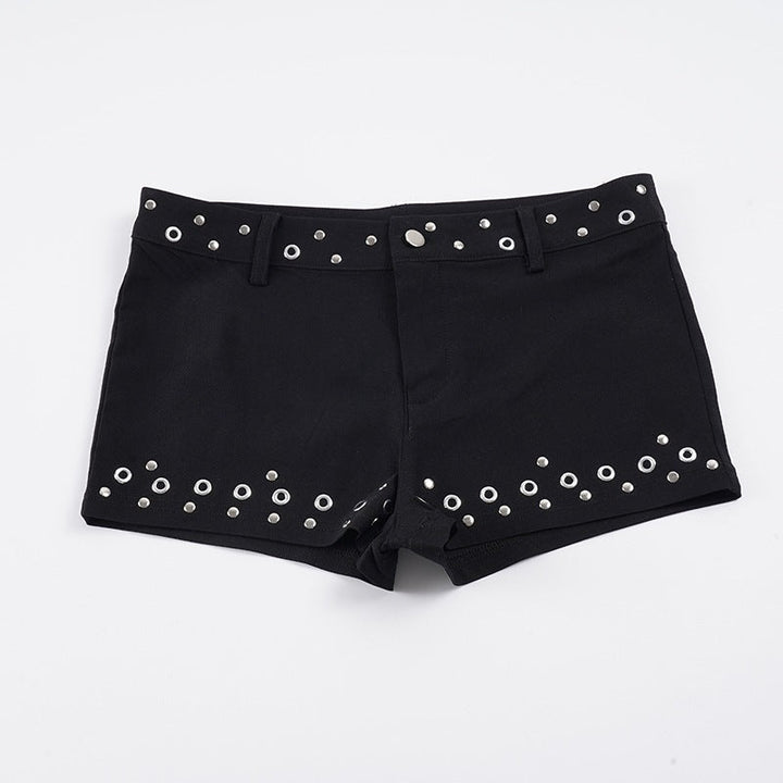Stilige dame shorts med metallringer, trendy design for en komfortabel og moderne sommerlook.
