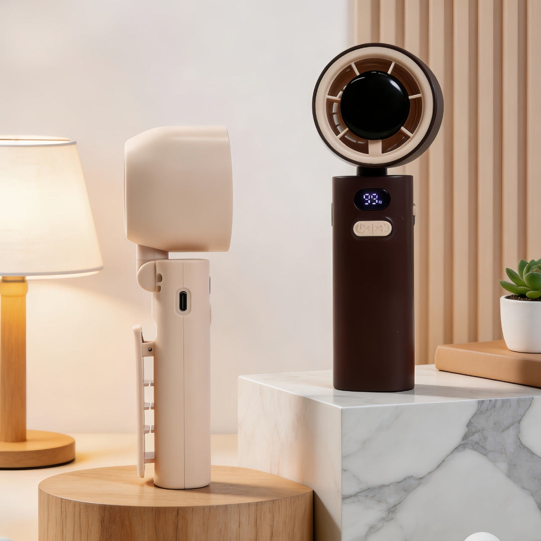Bærbar minivifte for dame i fargen rosa. USB-drevet personlig vifte for kjøling på reise, kontor og utendørs.