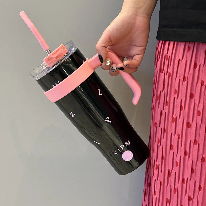 Stor 1200ml isolert drikkeflaske for dame med bærehåndtak. Optimal gjenbrukbar termos for langvarig hydrering.