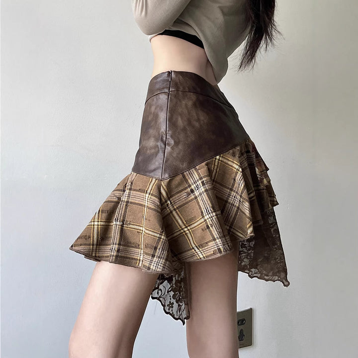 Dame asymmetrisk omslagsskjørt i brun med feminine volanger. Stilig og moderne design for en trendy look.