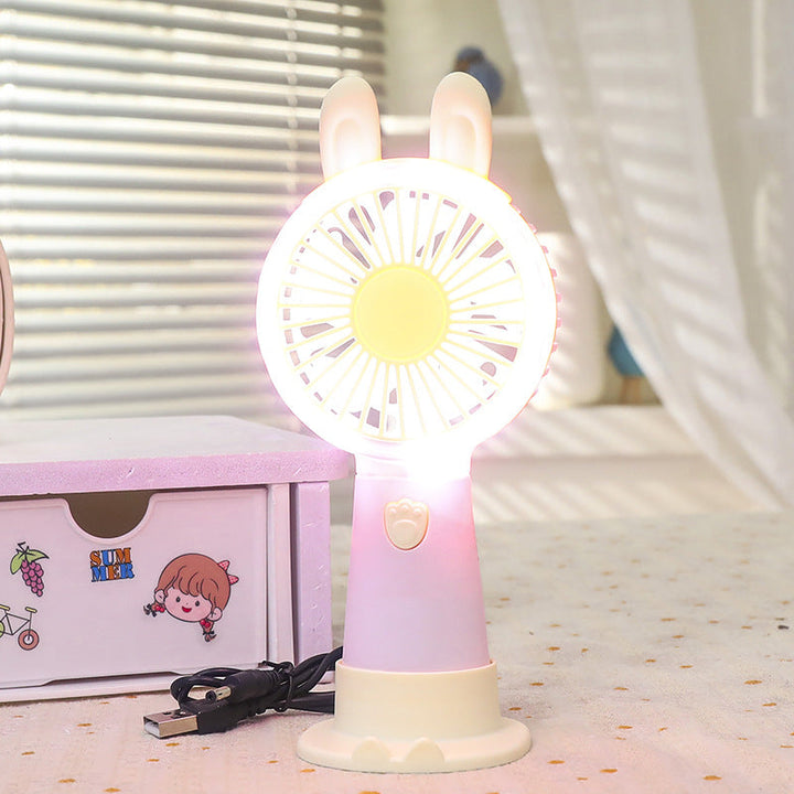 Personlig mini-vifte med LED-lys, perfekt for avkjøling på kontor eller reise.