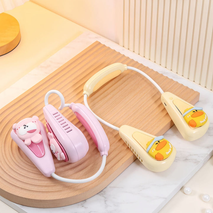 Bærbar minivifte i hvit/svart for personlig kjøling, ideell for sommer og reise. USB-lading.