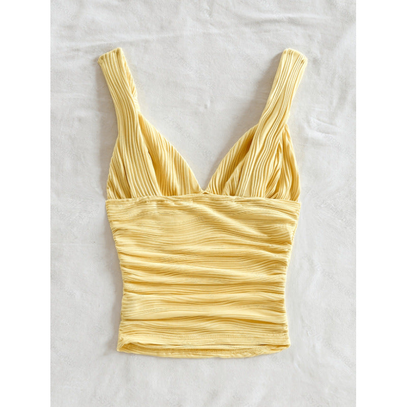Feminin dame kroppet topp i lys gul med volangkant. Elegant stil, justerbare stropper for sommer.