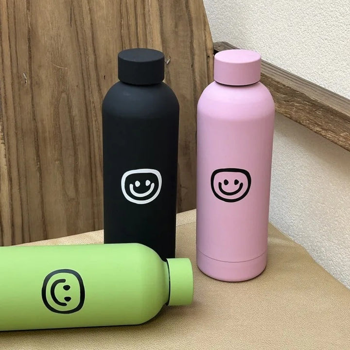 Kvinner termosflaske, 500ml rustfritt stål, med søtt smiley-design. Bærbar for varme/kalde drikker.