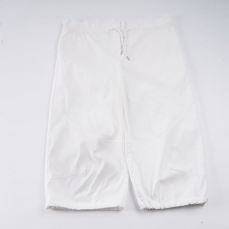 Dame sporty joggebukse, avslappet passform med praktisk justerbar linning. Ideell komfort for fritid og trening.