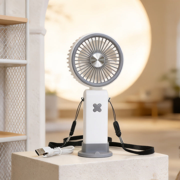 Kompakt USB-drevet håndvifte med bøyelig stativ, en essensiell sommer- og reisegadget.