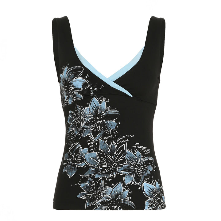 Casual svart dametopp med spaghetti-stropper og blomsterprint. V-utskjæring for en moteriktig sommerlook.
