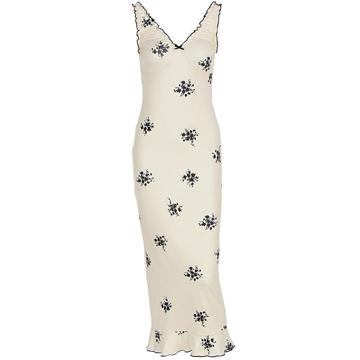 Stilig damekjole: Aprikos maxikjole med volanger, blomstermønster og V-hals. Elegant festkjole/sommerkjole.