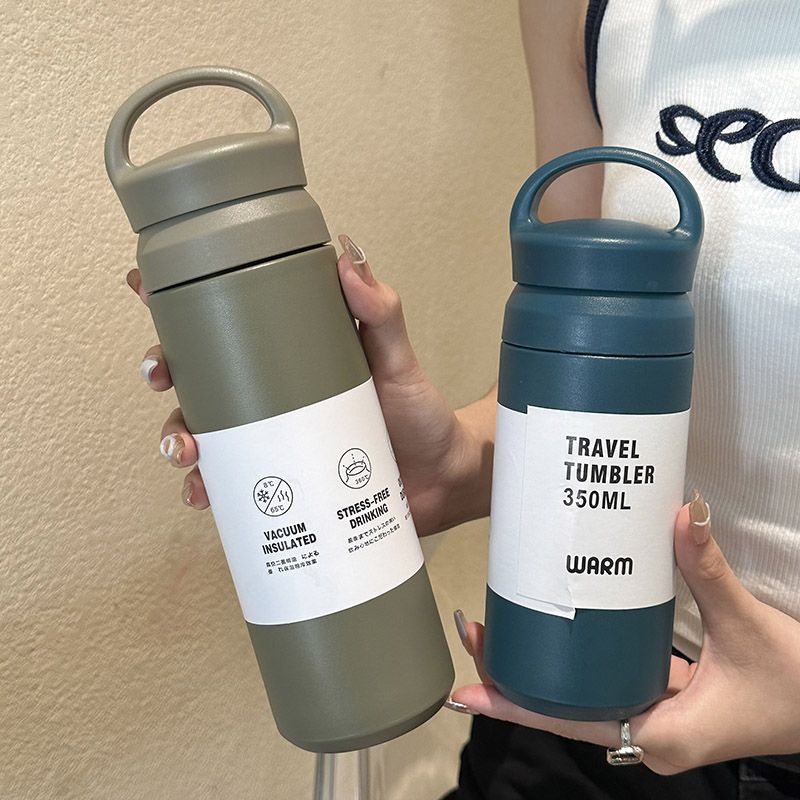 Kompakt 350ml termokopp for kvinner, holder kaffe/te varm på farten. Ergonomisk drikkeflaske, lekkasjesikker.