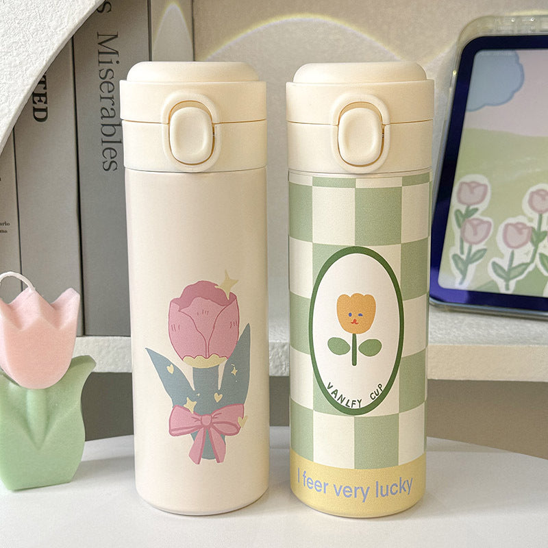500ml isolert drikkeflaske i rustfritt stål, damemodell med nydelig grønt/gult blomsterdesign. Gjenbrukbar termos.