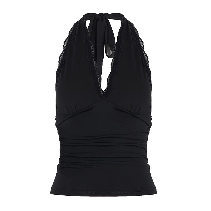 Dame halterneck topp, svart V-hals, elegant og stilfull, perfekt for en moteriktig look.