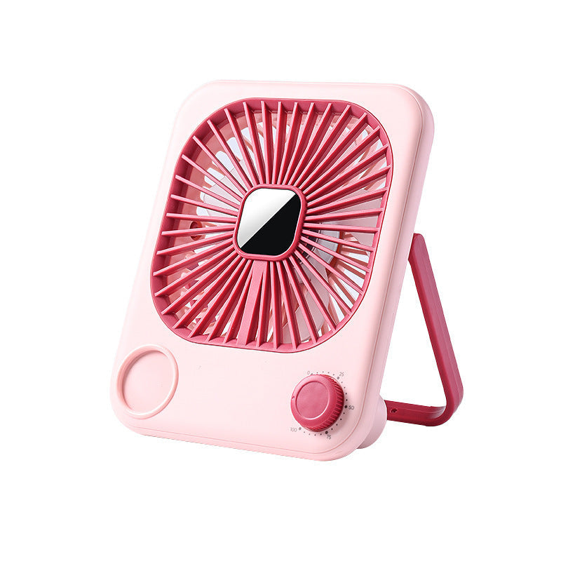 Kompakt fuksia USB skrivebordsvifte for effektiv kjøling. Ideell til kontoret eller hjemmekontoret.