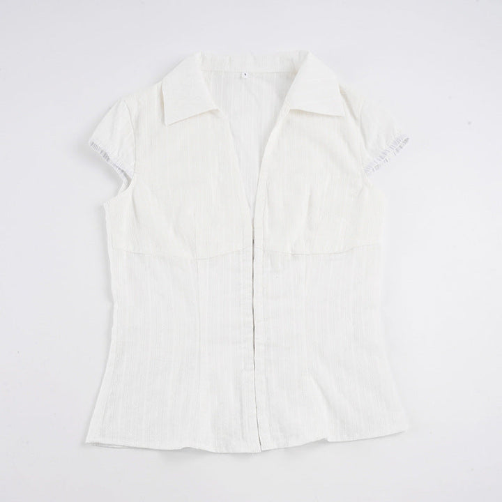 Allsidig kortermet damebluse, elegant stil med ståkrage og glidelås. Komfortabel hverdagstopp.