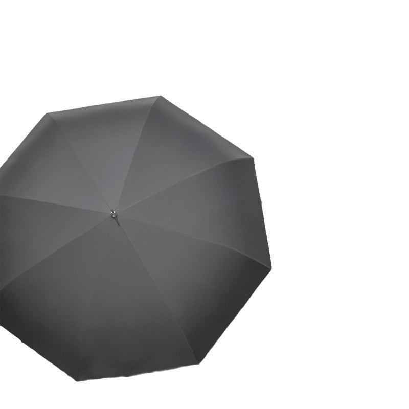 Elegant svart dame paraply, perfekt for å holde deg tørr og stilig på regnfulle dager. Kompakt og robust.