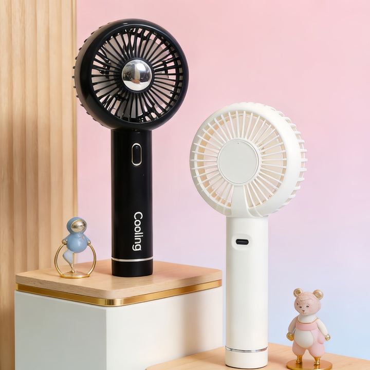 Kompakt reisevifte/håndvifte for sommerbruk. Den bærbare USB-viften gir umiddelbar kjøling utendørs.