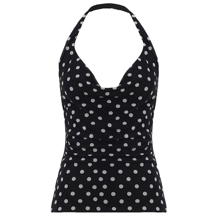 Trendy dame spaghetti-topp med prikker, en feminin og elegant sommer topp for moderne kvinne mote. Perfekt.