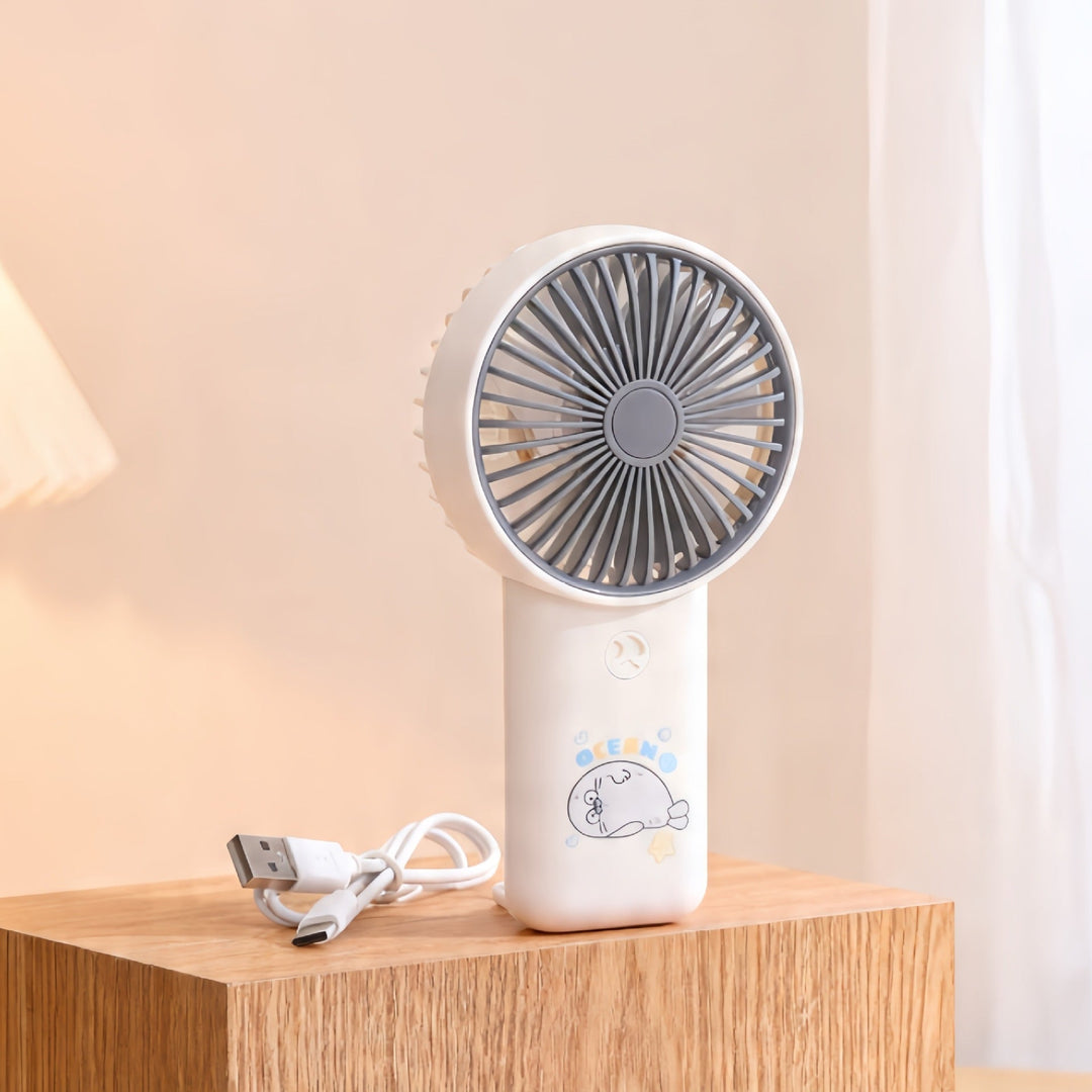 Liten damevifte med USB, perfekt gadget for kjøling. Passer til reise, kontor og utendørs bruk, svært portabel.
