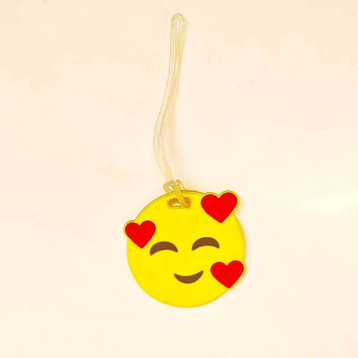 Enkel å feste emoji bagasjelapp i silikon, sikrer at din koffert er lett identifiserbar under reisen.