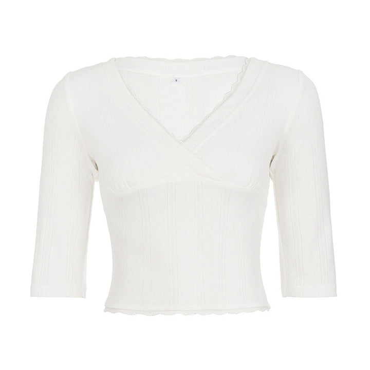 Stilig mønstret kortermet omslagsbluse for damer, med en komfortabel passform og elegant uttrykk.