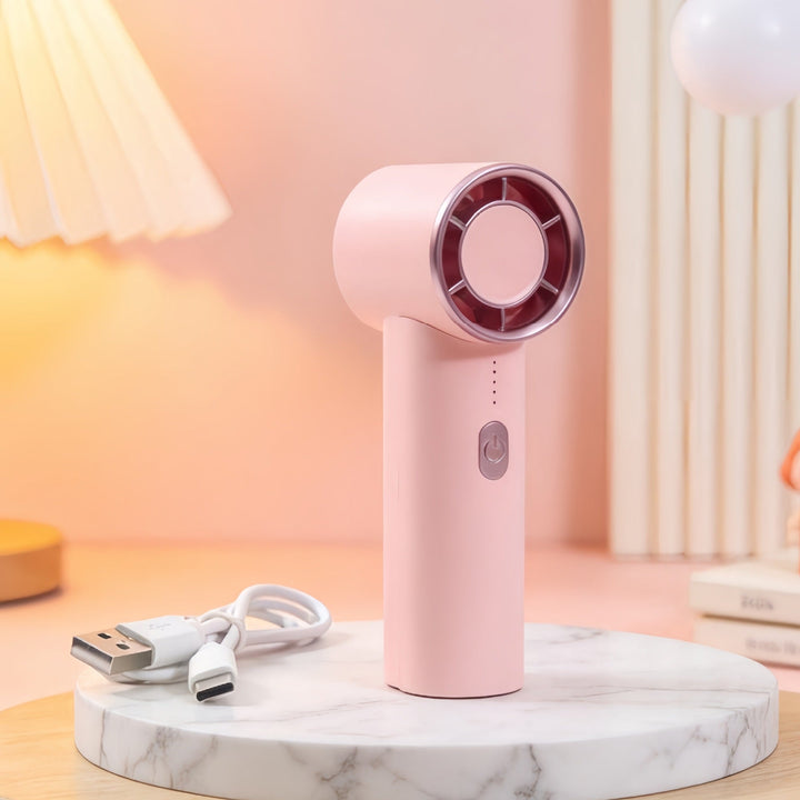 Effektiv bærbar USB-vifte i rosa, ideell for å lindre hetebølger for kvinner på farten. Kompakt design, lett å bære.