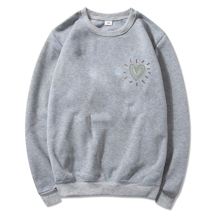 Vår- og høstgenser: Oversized sweatshirt med hjerter. Avslappet og komfortabel stil for damer.
