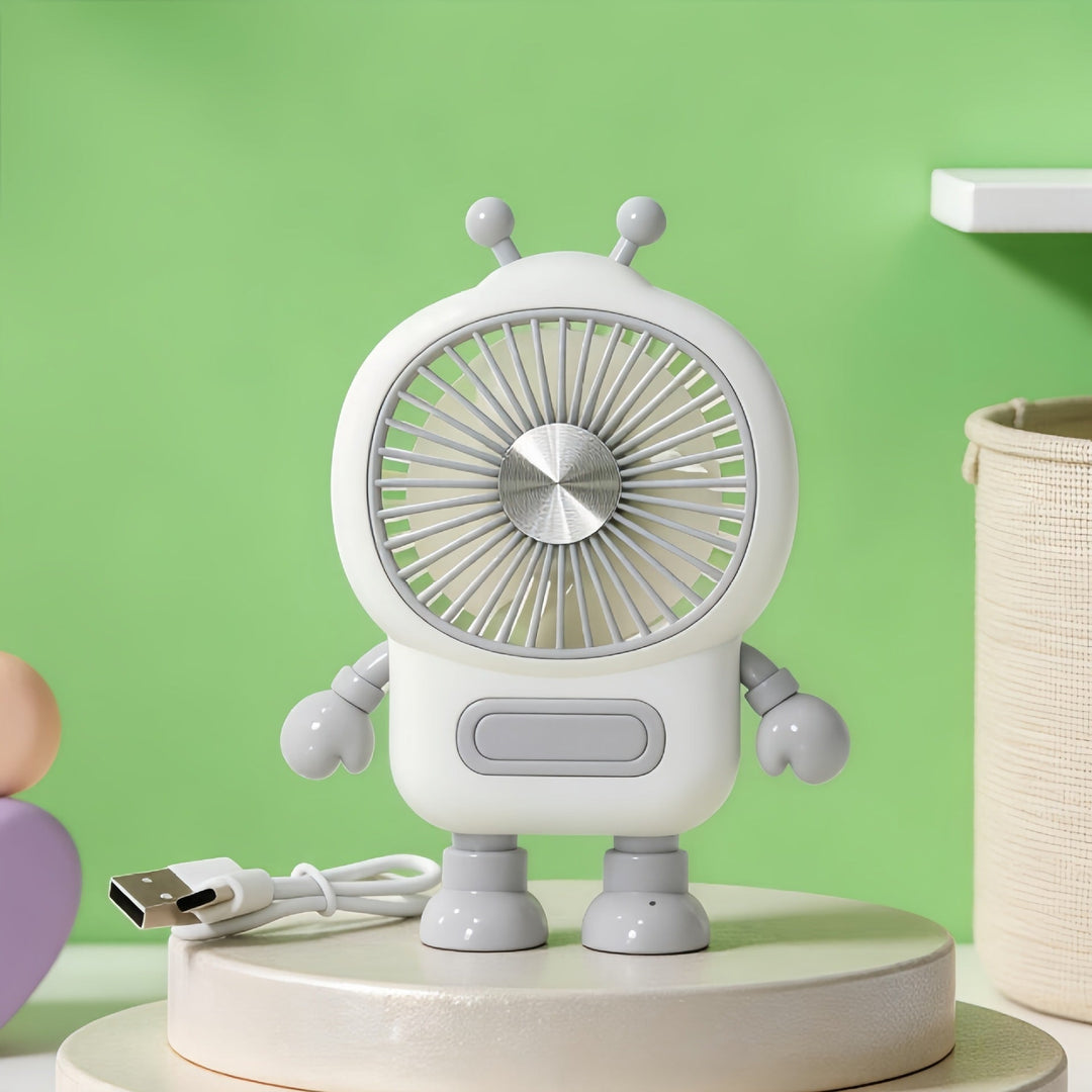 Hold deg avkjølt med denne bærbare miniviften i robotdesign. USB-ladbar, perfekt for sommer og reise.