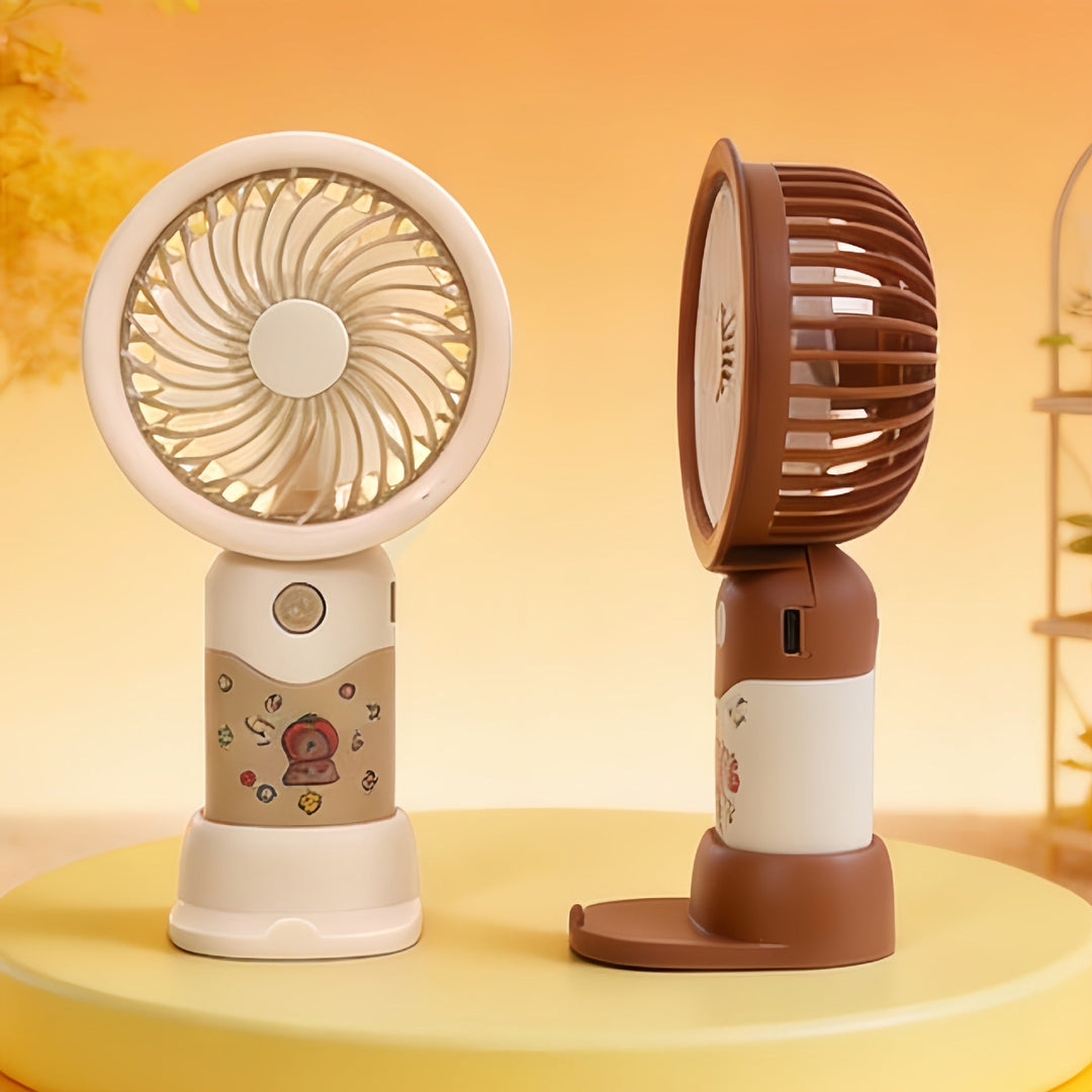 Bærbar håndvifte for dame med søtt motiv og ergonomisk design, perfekt for sommer.