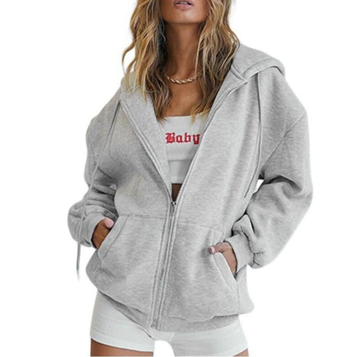 Komfortabel dame hettejakke med oversized snitt og praktiske lommer. Ideell for avslapning.