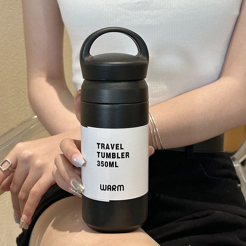 Elegant kaffekopp/tekopp, 350ml, for kvinner. Ergonomisk isolert termokopp i stål, holder drikken varm.