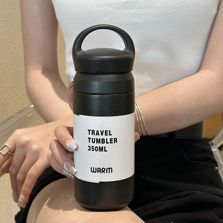 Elegant kaffekopp/tekopp, 350ml, for kvinner. Ergonomisk isolert termokopp i stål, holder drikken varm.
