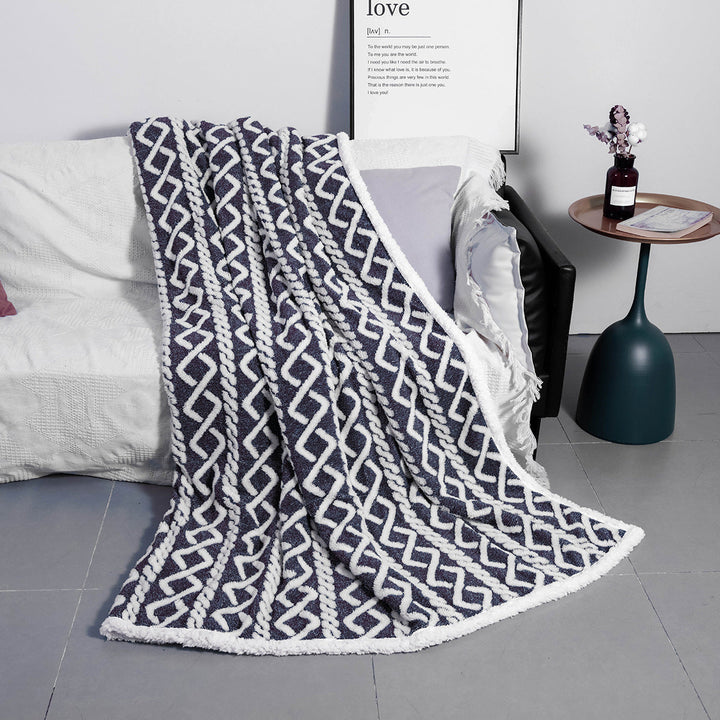Boho-inspirert kosepledd i høy kvalitet med myk tekstur, en flott detalj for stilfull hjemmeinnredning.