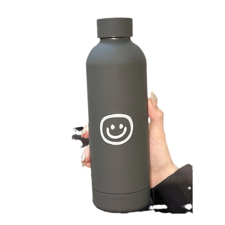 Allsidig isolert drikkeflaske 500 ml for kontor, reise eller trening. Kvinner elsker denne emoji-termoflasken.