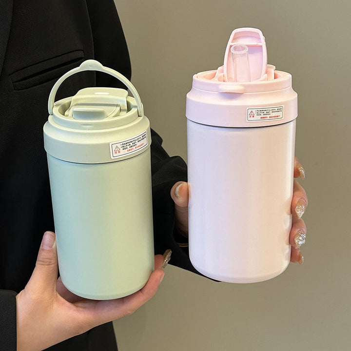 Bærbar isolert drikkeflaske/kaffekopp 500 ml for kvinner. Med håndtak og lekkasjesikker design for enkel transport.