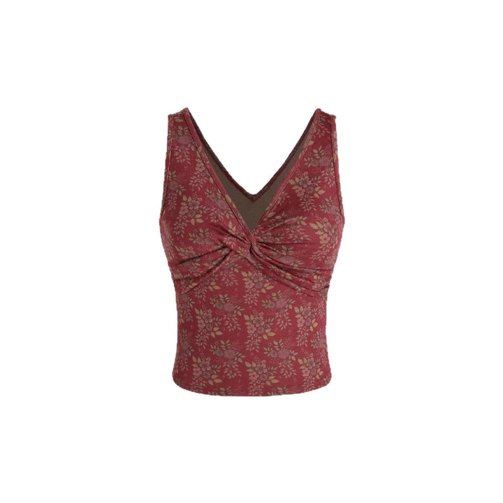 Komfortabel brun blomster topp med V-hals og rynker. Ideell for moderne kvinner som ønsker stil.