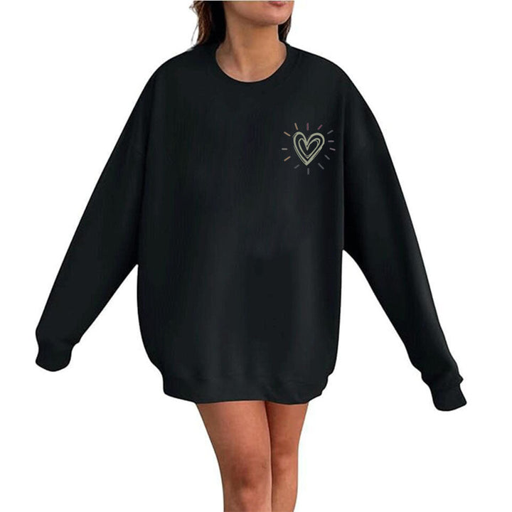 Damegenser: Oversized sweatshirt med søtt hjerte-motiv og avslappet passform for fritid.
