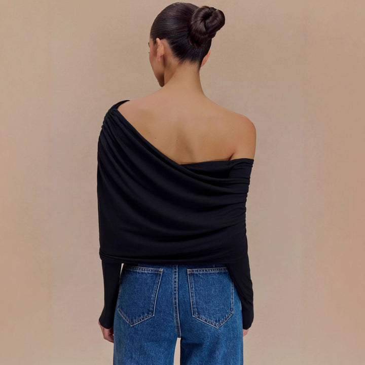 Elegant hvit stroppeløs dametopp, ideell for sommer, fest og en trendy look.