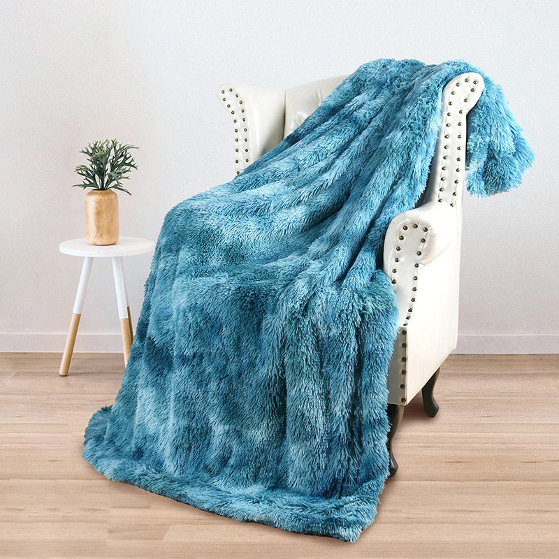 Dame kosepledd i myk fleece for avslappende stunder, perfekt for å tulle seg inn og nyte.