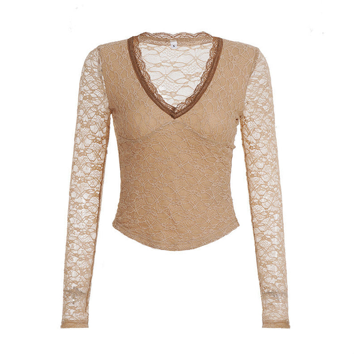 Stilig brun spissbluse for dame, med dyp V-hals og lange ermer. Komfortabel og elegant for både hverdag og fest.