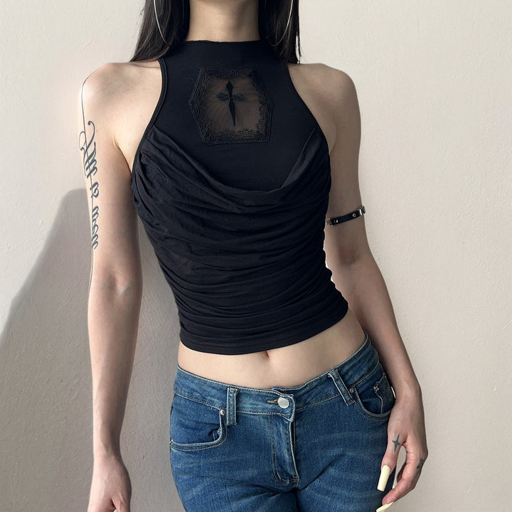 Svart elegant tanktopp for kvinner med moderne design og stilig ryggdetalj. Perfekt sommermote.