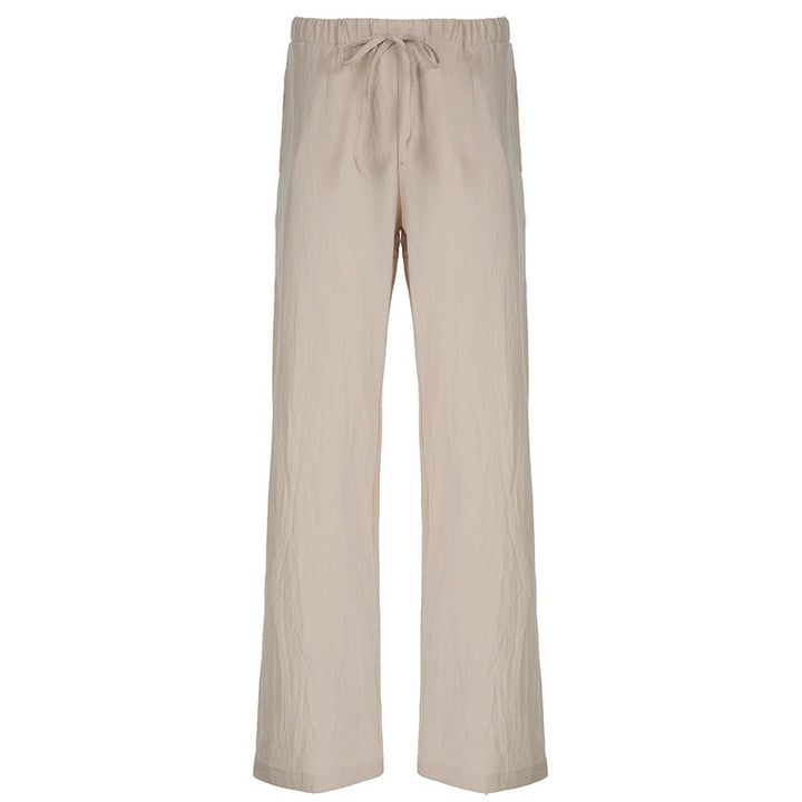 Trendy vide damebukser med justerbar midje og sidelommer, perfekt for en komfortabel og chic sommerlook.