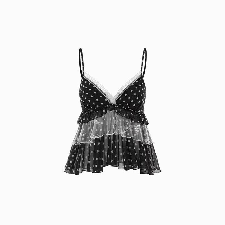 Elegant spissetopp for dame med pene volanger, et lekent og stilfullt design for sommeren.