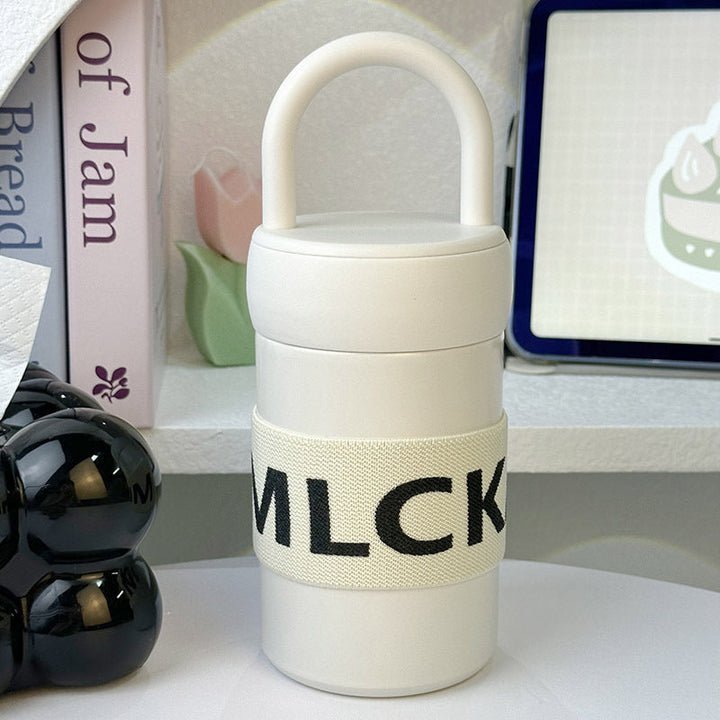 Dame multifunksjonell termokopp i elegant design, perfekt for kaffe og te på farten.