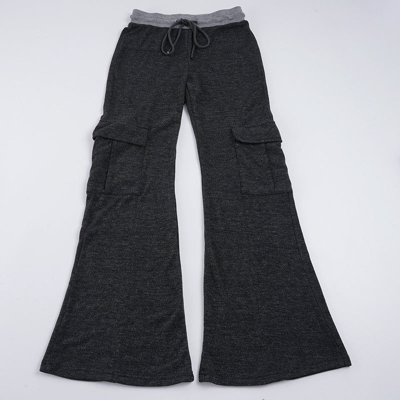Dame brede cargo-bukser i ulike farger som beige og grønn, viser allsidighet for casual vår/sommer.