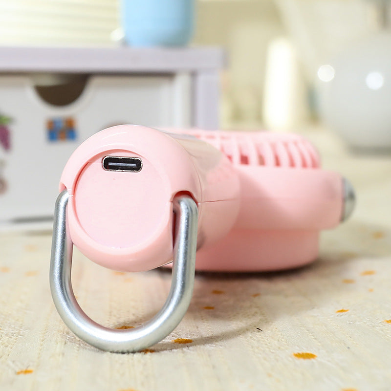 Mørk brun USB-vifte, en bærbar gadget med dyredesign. Essensiell for kjøling på sommeren.