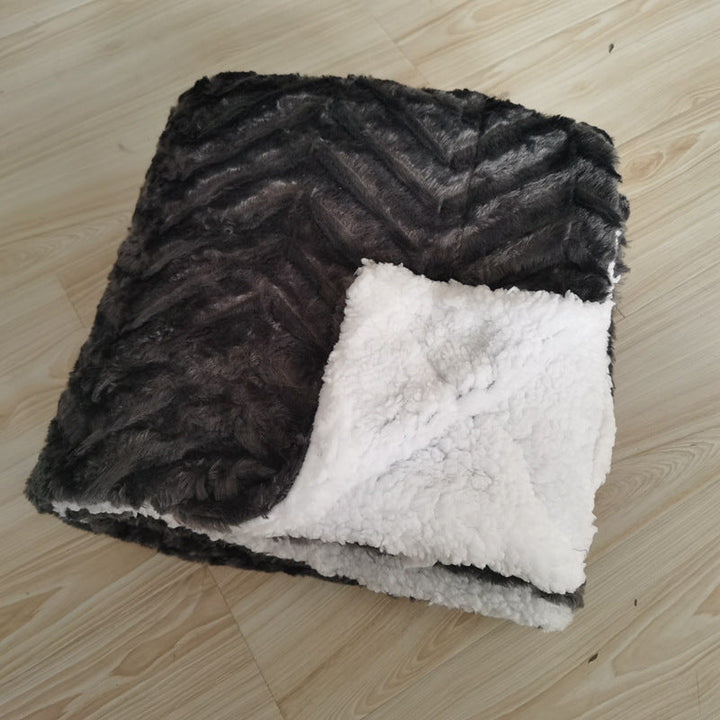 Behagelig kosepledd for kvinner, laget av myk mikrofiber for ekstra komfort og varme.