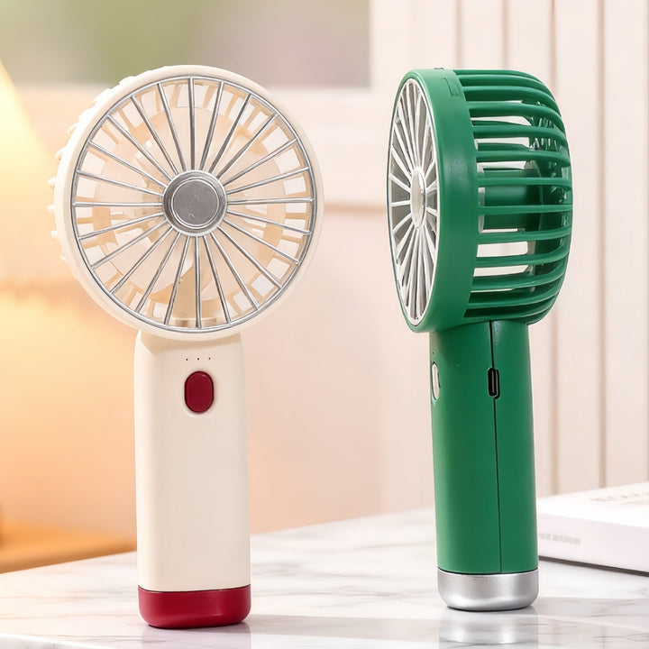 Bærbar håndvifte for dame, ideell for avkjøling på sommeren. Kraftig batteri og ergonomisk design.