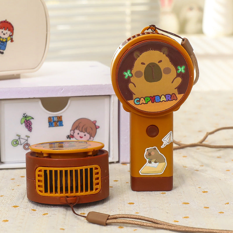 Kompakt Capybara USB vifte, perfekt bærbar for reiser, kontor og sommerens avkjøling.